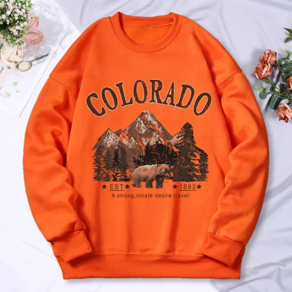 Woman wearing vintage travel print oversized hoodie