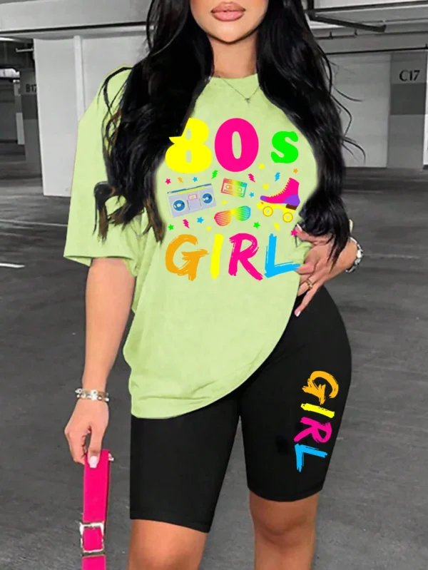 Woman wearing colorful 80s print t-shirt and matching casual shorts two-piece set.