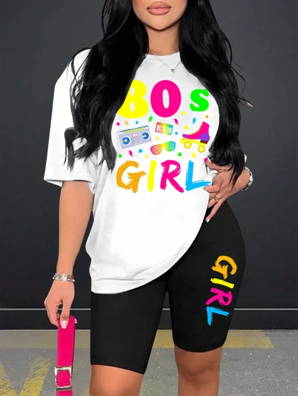 Woman wearing colorful 80s print t-shirt and matching casual shorts two-piece set.