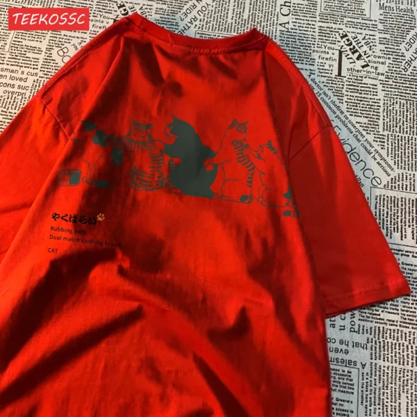 Women's loose fit t-shirt featuring a funny cartoon cat print