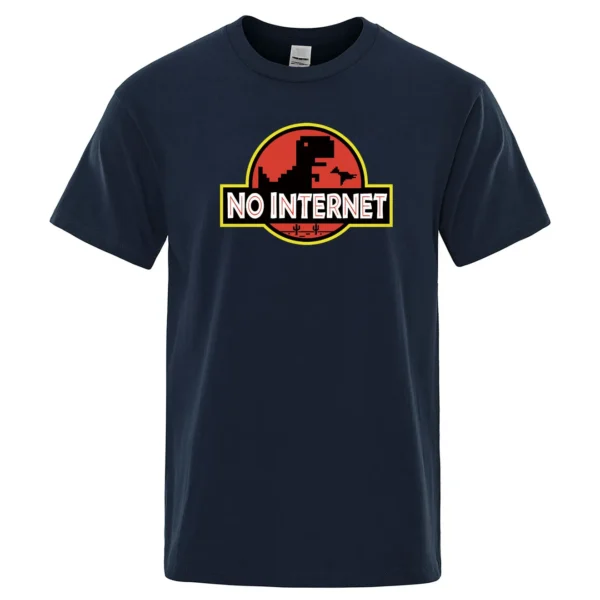 Man wearing funny black t-shirt with white cartoon 'No Internet' T-Rex dinosaur graphic print jumping over cacti.