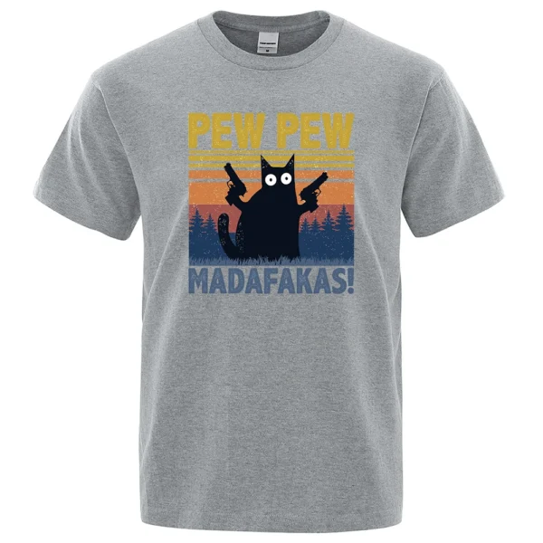 Man wearing black cotton t-shirt with funny graphic of a cat holding guns that reads 'Pew Pew Madafakas'.