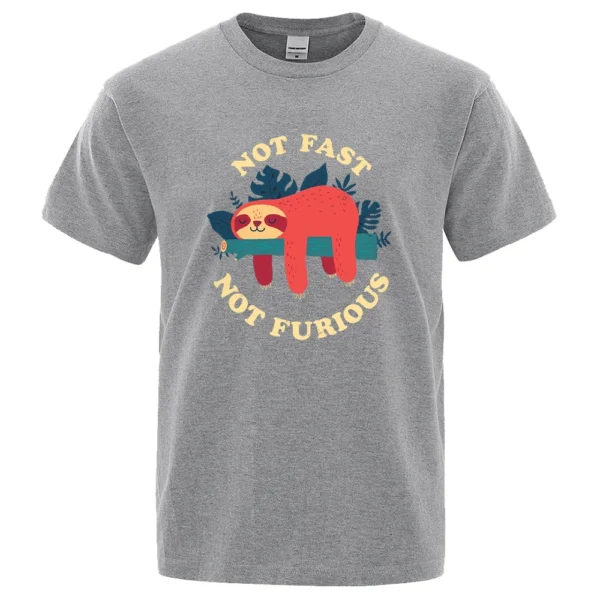 Model wearing funny 'Not Fast Not Furious' sloth graphic tee in breathable cotton. Unisex casual summer style.