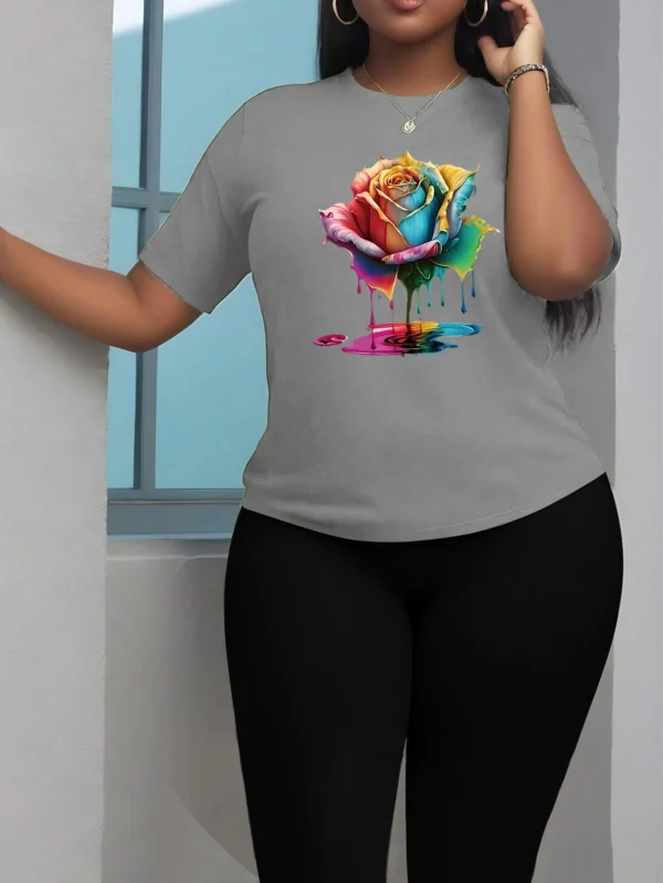 Floral print two-piece set with short sleeve t-shirt and capri leggings.