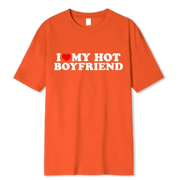 Person wearing funny black graphic tee with white 'I Love My Hot Girlfriend/Boyfriend' text print.
