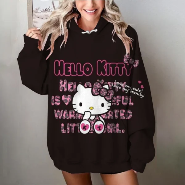 Women's black and white oversized Hello Kitty sweatshirt with long sleeves. Y2K style loose fit pullover top.