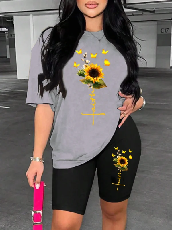 Woman modeling sunflower butterfly print two piece set with short sleeve knit t-shirt and regular fit shorts.