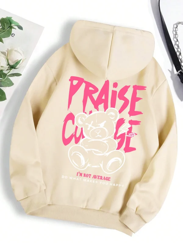 Woman wearing cute bear print fleece-lined hoodie warm autumn streetwear sweatshirt.
