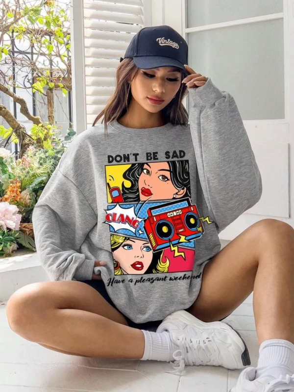 Women's casual warm fleece sweatshirt with a cartoon graphic print.