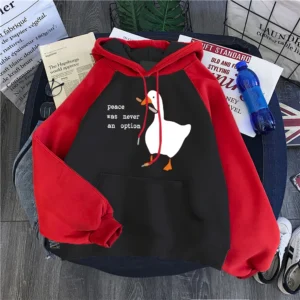 Woman wearing a black "Peace Was Never An Option" printed hoodie.