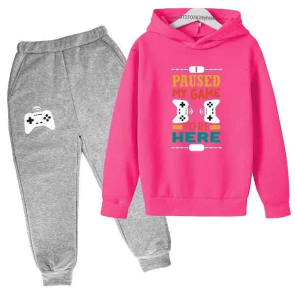 Kids gamer tracksuit set with 'I Paused My Game To Be Here' slogan on hooded sweatshirt and matching pants for boys or girls.