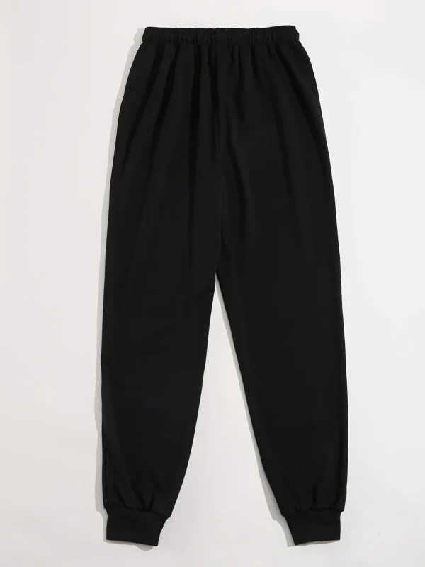 Women's black loose fit drawstring sweatpants with 'I Love My Boyfriend' white graphic print on the leg.