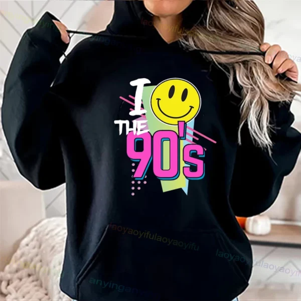 Woman wearing a vibrant neon hoodie with 'Take Me Back To The 90's' graphic print