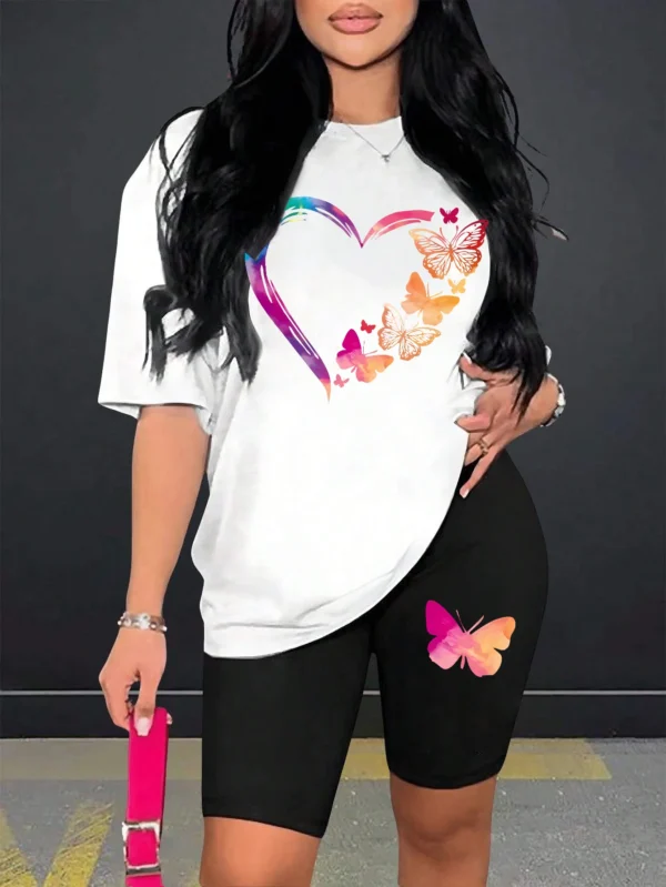 Woman modelling a comfortable butterfly print t-shirt and matching shorts set - summer casual wear.