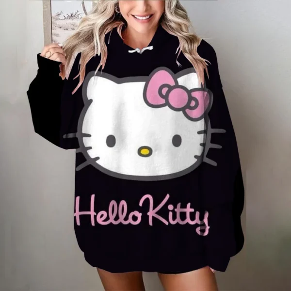 Women's black and white oversized Hello Kitty sweatshirt with long sleeves. Y2K style loose fit pullover top.