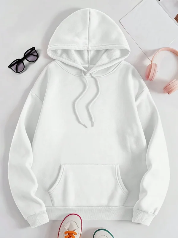 Woman wearing a "My Shadow Has Four Legs" fleece hoodie.