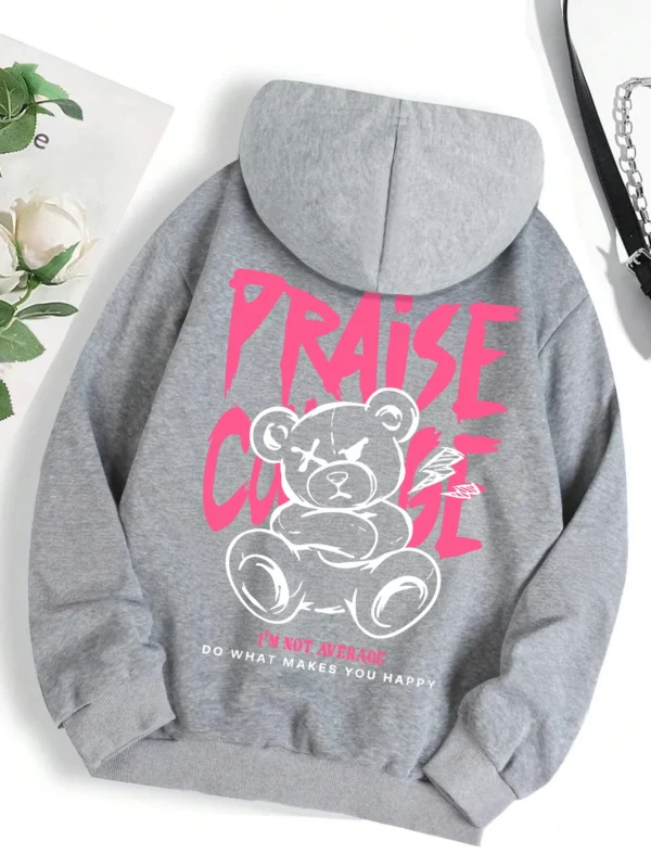 Woman wearing cute bear print fleece-lined hoodie warm autumn streetwear sweatshirt.