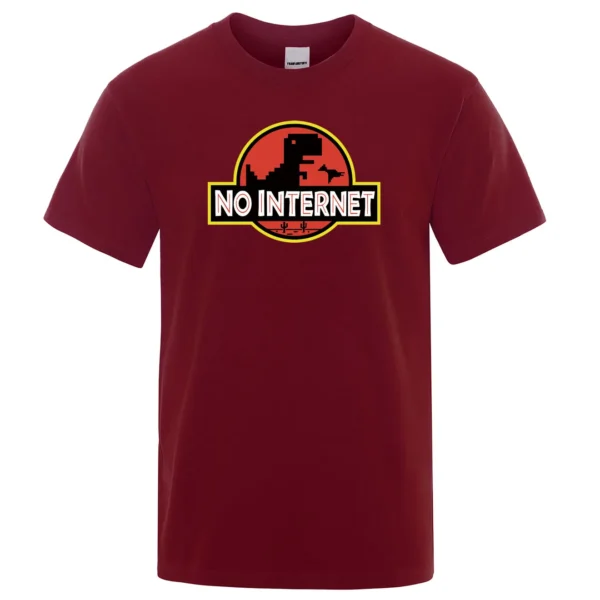 Man wearing funny black t-shirt with white cartoon 'No Internet' T-Rex dinosaur graphic print jumping over cacti.