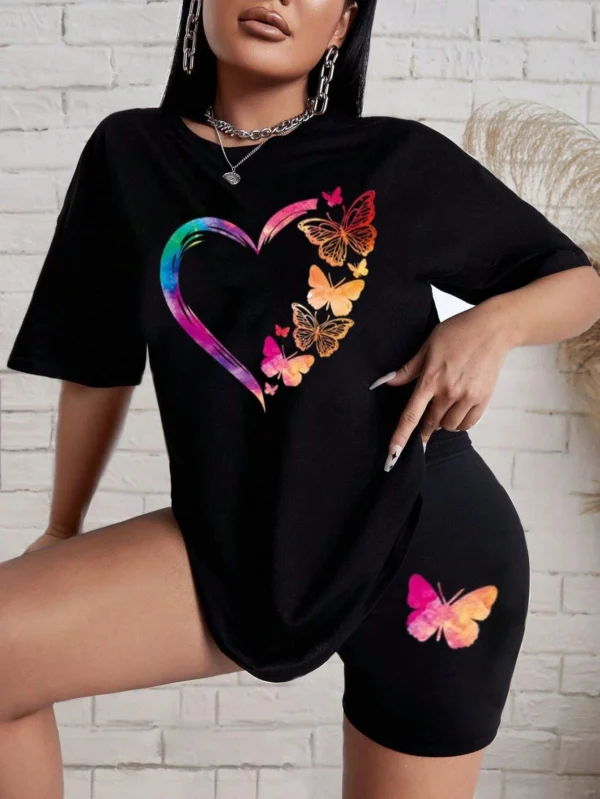 Woman modelling a comfortable butterfly print t-shirt and matching shorts set - summer casual wear.