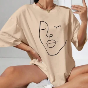 Woman wearing white cotton t-shirt with black minimalist line art face print. Casual short sleeve regular fit style. ```