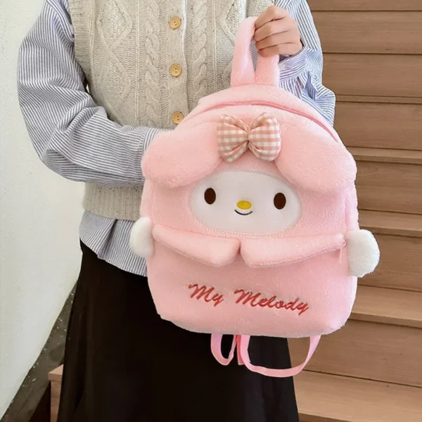 Front view of the MINISO plush backpack featuring cute Kuromi and Cinnamoroll Sanrio characters.