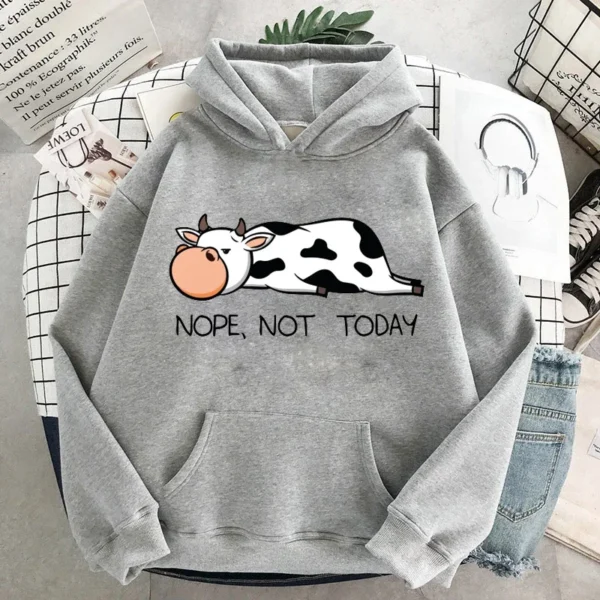 Women's pullover hoodie featuring a funny cartoon cow print with the text 'Nope Not Today'. Casual streetwear style.