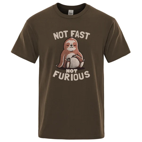 Oversized white cotton t-shirt for men featuring a funny kawaii sloth print and the text "Not Fast Not Furious". ```