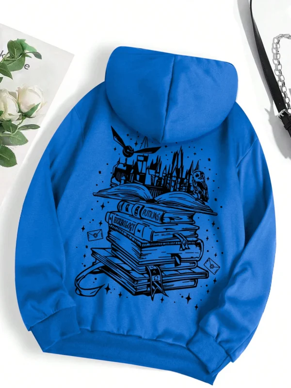 Woman wearing a cozy grey pullover hoodie with a humorous book-themed print on the front