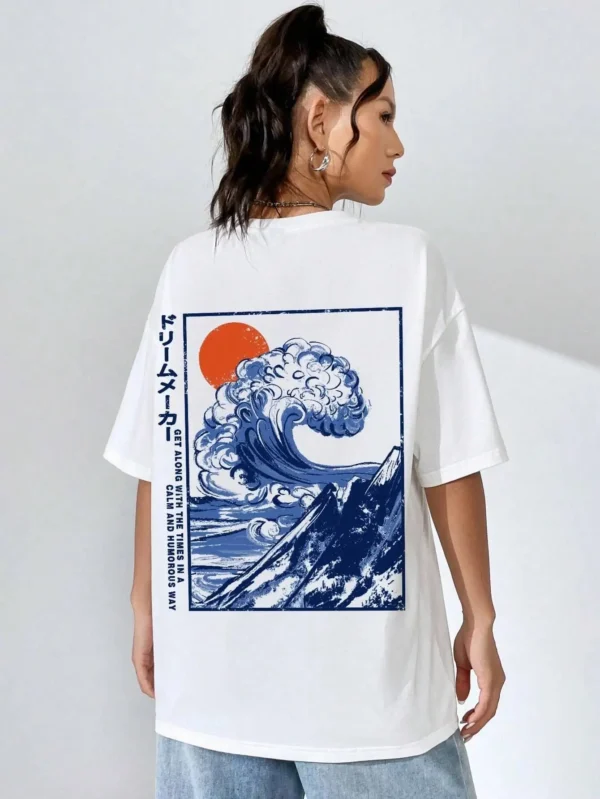 Women's cotton t-shirt featuring a vibrant Japanese wave and sunset graphic print. Relaxed fit.