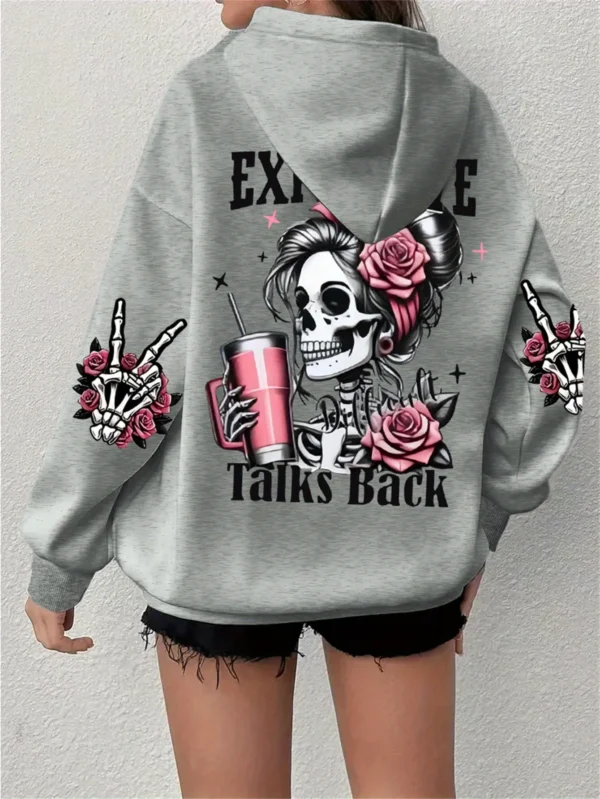 Woman wearing the warm grey fleece pullover hoodie with the funny 'Expensive Talks Back' print on the front.