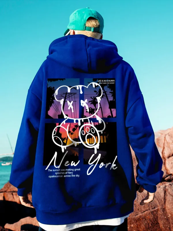 Men's black streetwear hoodie featuring a graphic print of a cool cartoon bear on the front. Pullover style with kangaroo pocket.