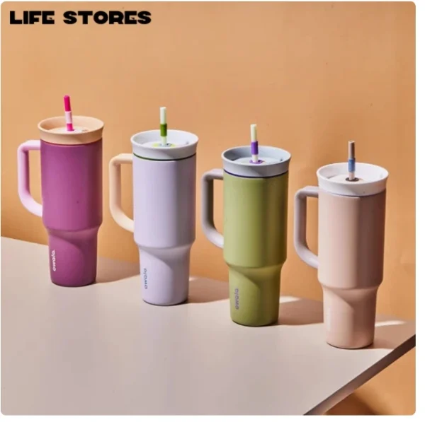 Owala Free Sip 40 oz Insulated Stainless Steel Tumbler with carry loop.