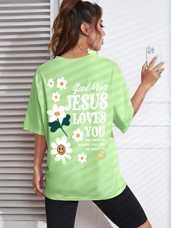 Woman wearing comfortable O-neck "Jesus Loves You" Christian graphic t-shirt for summer against a plain background.
