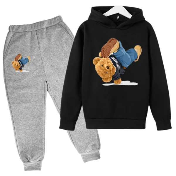 Child wearing fun cartoon bear print hooded tracksuit set with matching pants