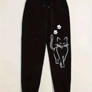 Woman wearing grey casual sweatpants with black cat print