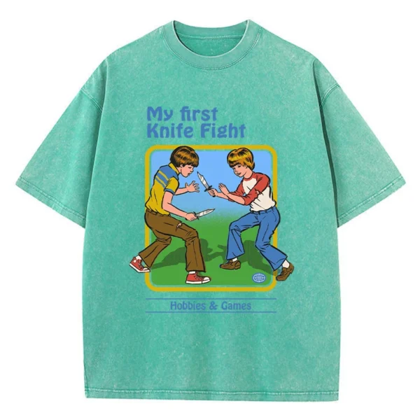Women's casual streetwear t-shirt with 'My First Knife Fight' cartoon graphic print.