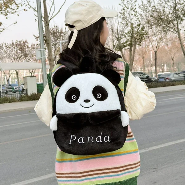 Front view of the MINISO plush backpack featuring cute Kuromi and Cinnamoroll Sanrio characters.