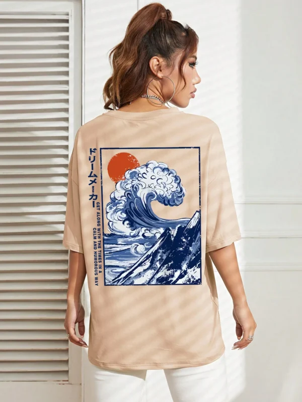 Women's cotton t-shirt featuring a vibrant Japanese wave and sunset graphic print. Relaxed fit.