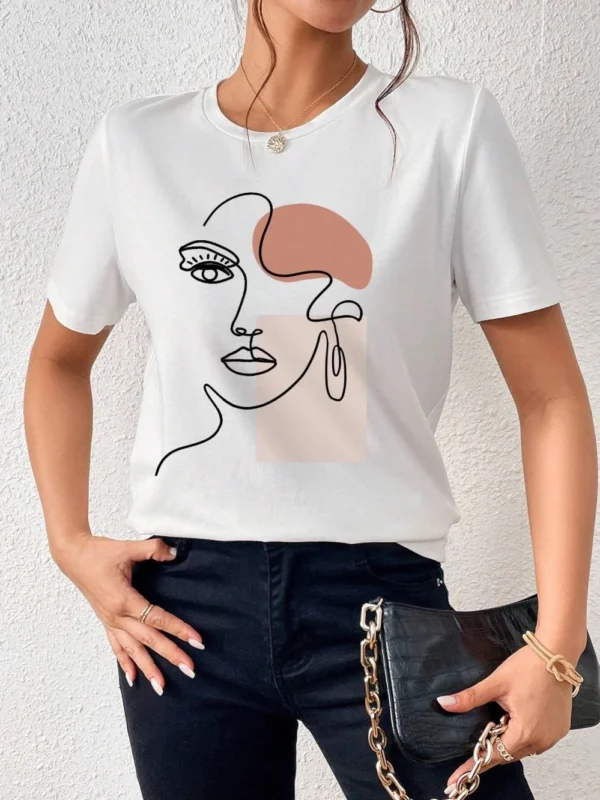 White 100% cotton women's t-shirt featuring a black minimalist artistic face print. Casual short sleeve crew neck graphic tee.