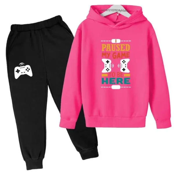 Kids gamer tracksuit set with 'I Paused My Game To Be Here' slogan on hooded sweatshirt and matching pants for boys or girls.