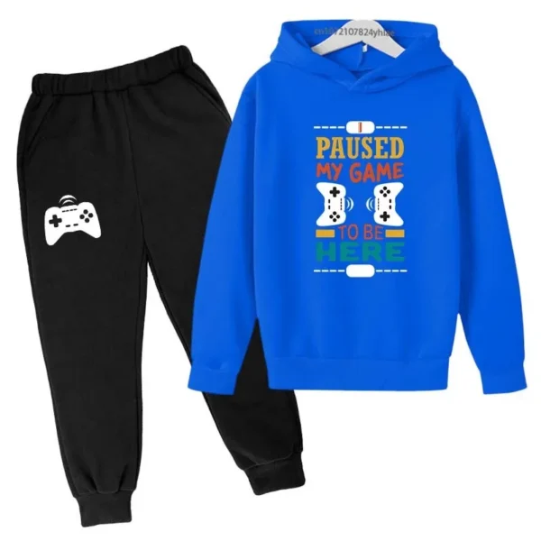 Kids gamer tracksuit set with 'I Paused My Game To Be Here' slogan on hooded sweatshirt and matching pants for boys or girls.