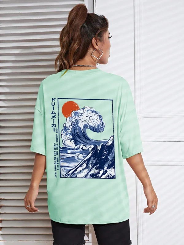 Women's cotton t-shirt featuring a vibrant Japanese wave and sunset graphic print. Relaxed fit.