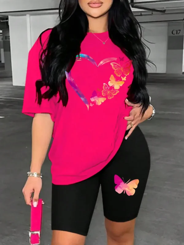Woman modelling a comfortable butterfly print t-shirt and matching shorts set - summer casual wear.