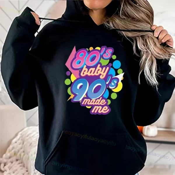 Woman wearing a vibrant neon hoodie with 'Take Me Back To The 90's' graphic print