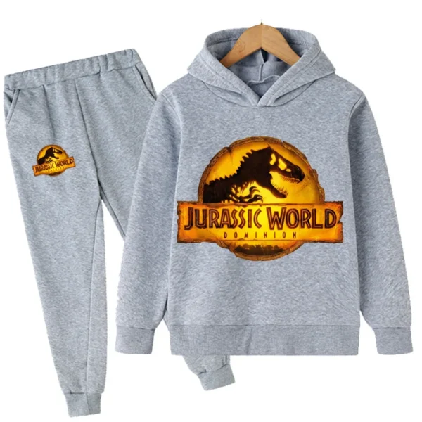 Child wearing fun dinosaur print hoodie and matching pants set - outfit for boys and girls.