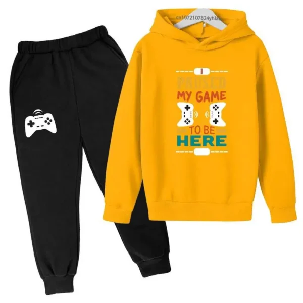Kids gamer tracksuit set with 'I Paused My Game To Be Here' slogan on hooded sweatshirt and matching pants for boys or girls.