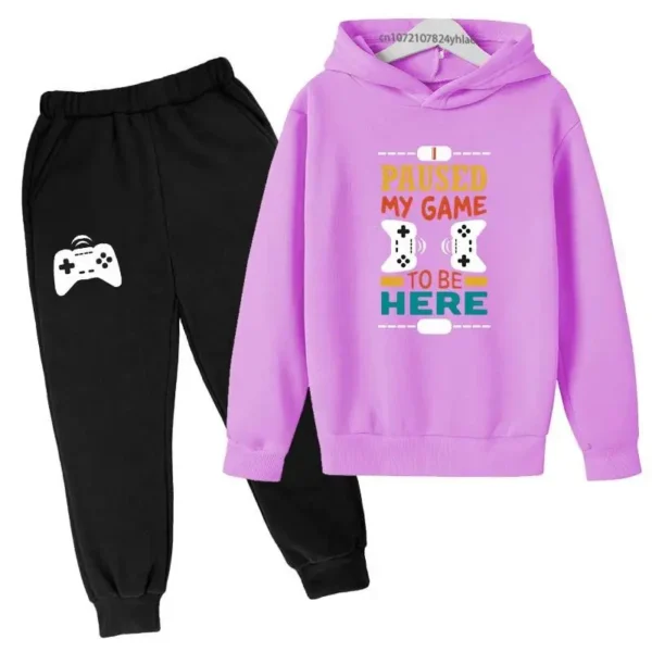 Kids gamer tracksuit set with 'I Paused My Game To Be Here' slogan on hooded sweatshirt and matching pants for boys or girls.