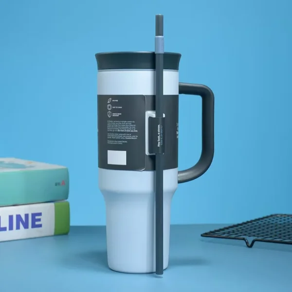 Owala Free Sip 40 oz stainless steel water bottle with straw lid.