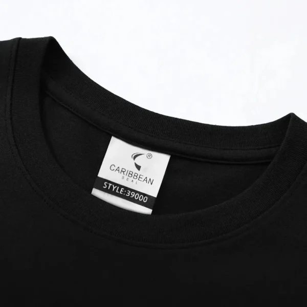 Back view of man wearing black GTR R34 JDM graphic t-shirt showcasing Japanese car culture design.