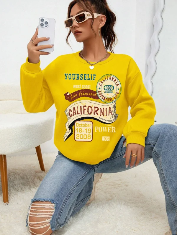 Women's loose fit fleece-lined hoodie sweatshirt with 'California Yourself' letter print on the front.